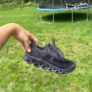 On Running Black Athletic Shoes with Cushioned Sole